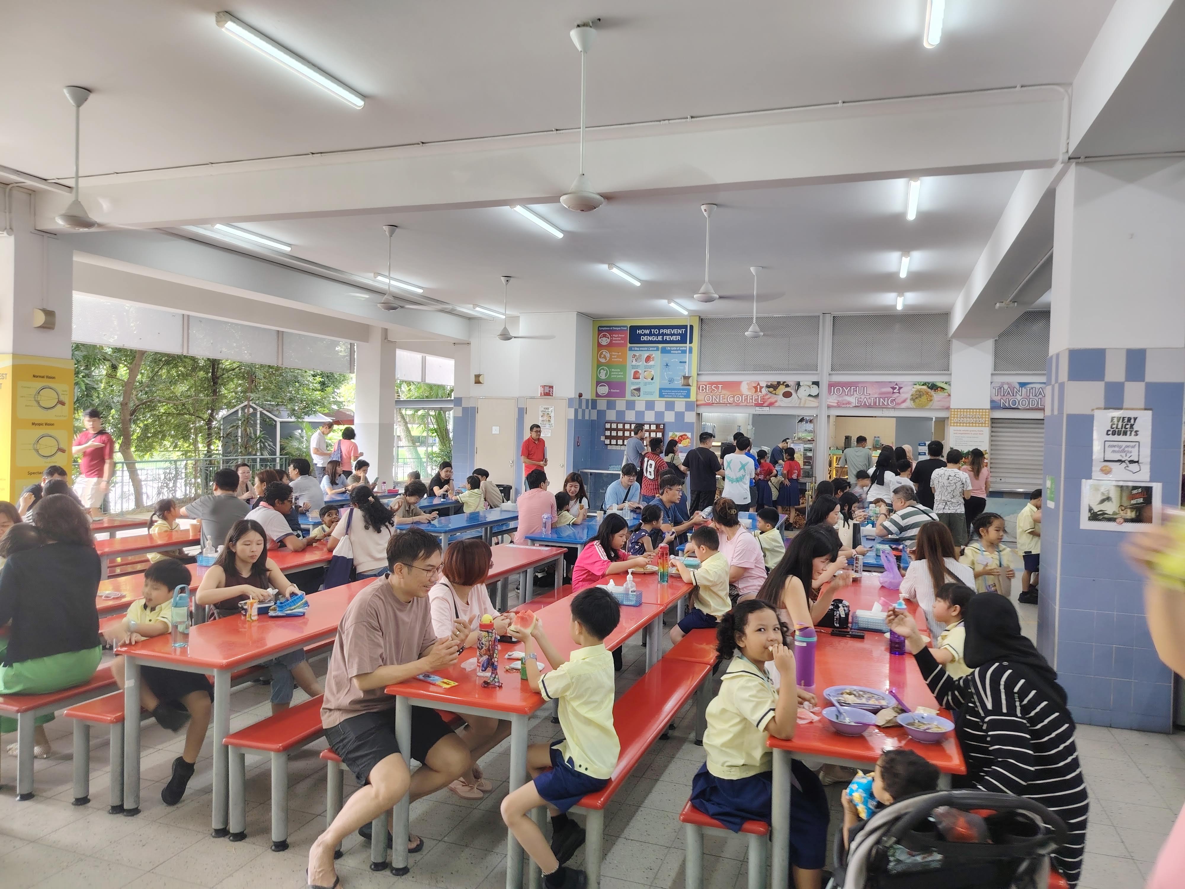 P1 students and their parents having recess together